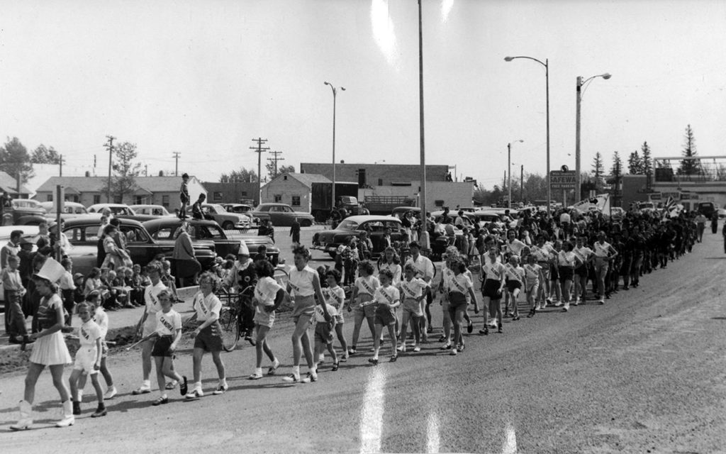 Canora Tot Lot Opening Parade, 1956. Melton Real Estate and Safeway in the background. Courtesy of City of Edmonton Archives, EA-10-1084.