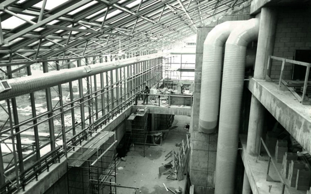 B&W photo showing the construction of the interior of the MacEwan campus, 1980